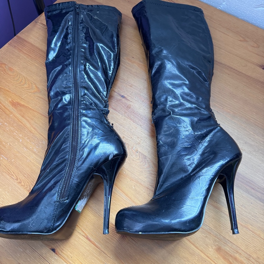 Stiletto knee high pleather boots size 7